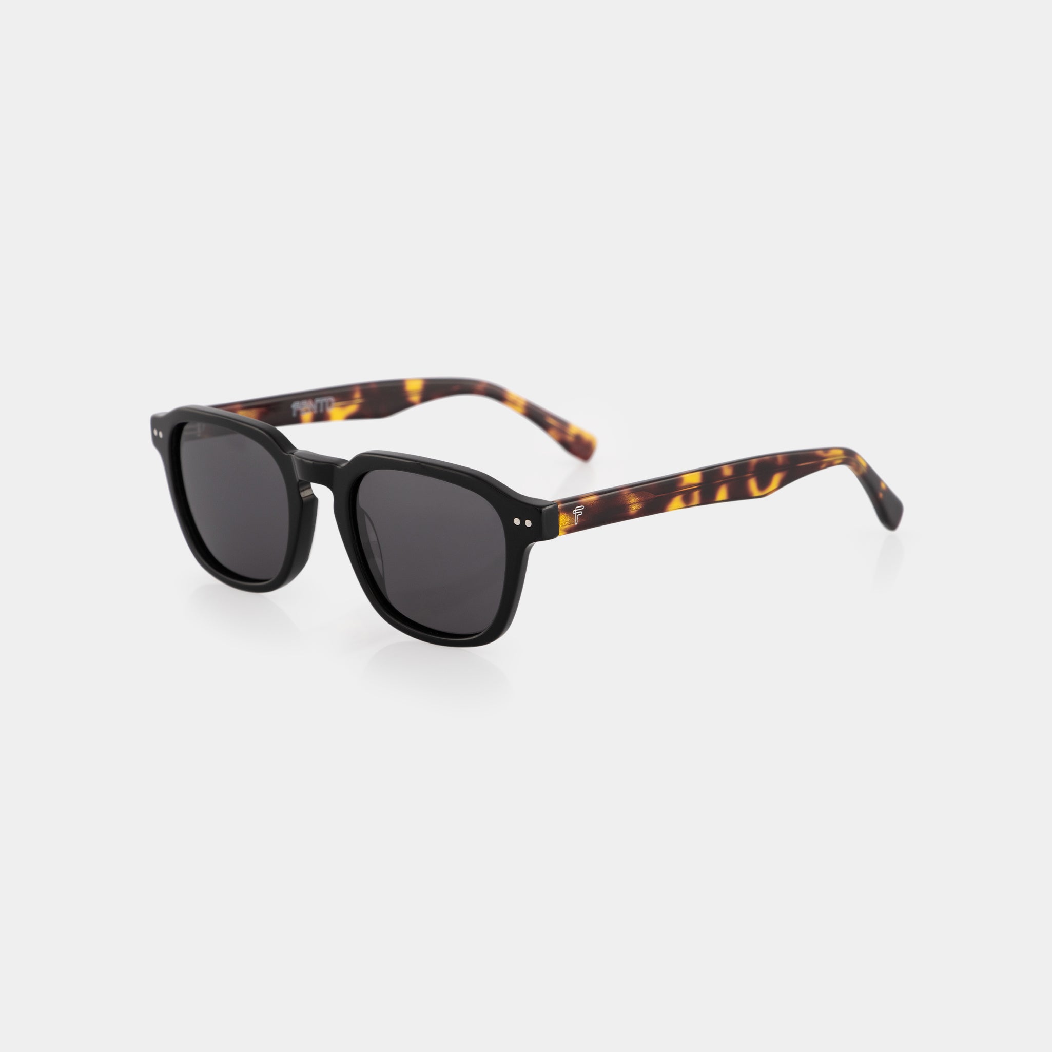 Classic with a twist. Crafted from premium black tortoise acetate, the Nova sunglasses by Fento offer a bold yet refined look — perfect for making a statement under the sun.